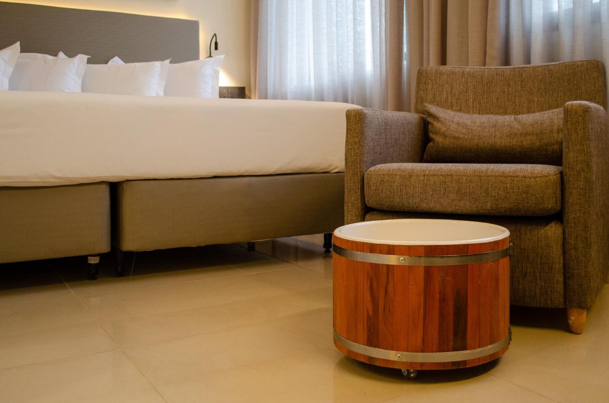 Royal Boutique Savassi Hotel Belo Horizonte Luaran gambar A barrel table