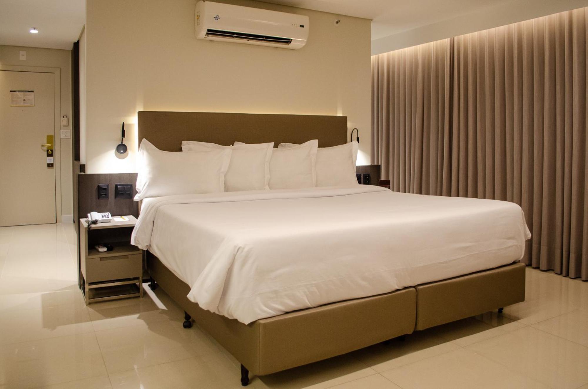 Royal Boutique Savassi Hotel Belo Horizonte Luaran gambar A bedroom at the hotel