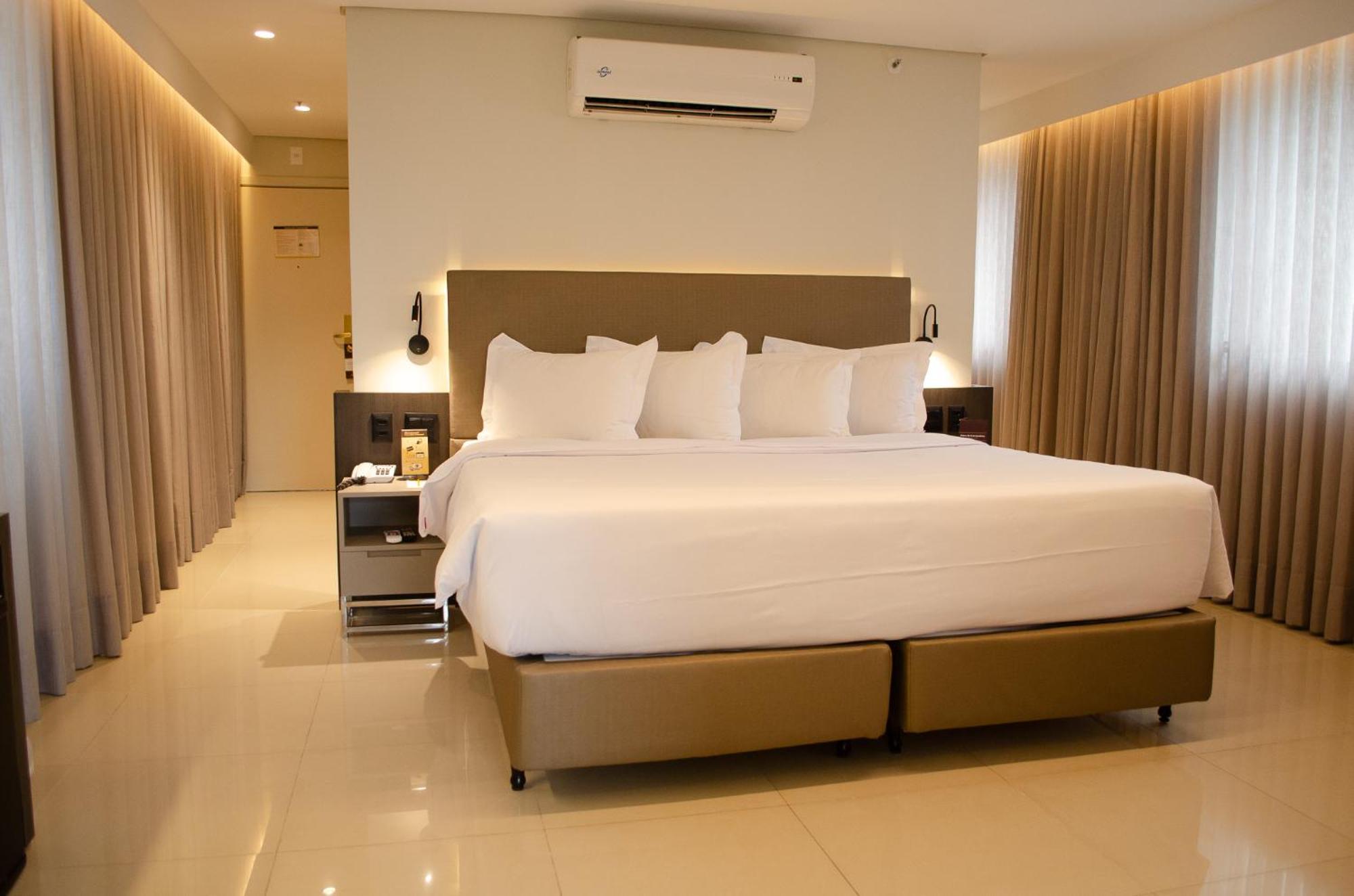 Royal Boutique Savassi Hotel Belo Horizonte Luaran gambar A bedroom at the hotel